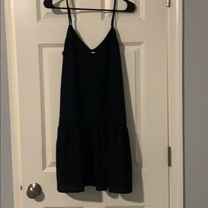 Black dress with ruffles at bottom